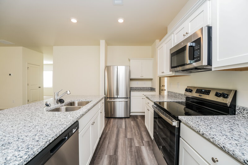 1,930/Mo, 7403 Cranleigh St Covington, GA 30014 Kitchen View 2