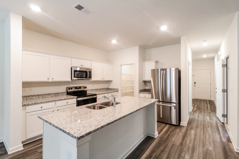 2,325/Mo, 7546 Saffron Ave Covington, GA 30014 Kitchen View 2