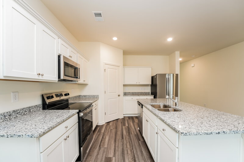 3,160/Mo, 7404 Cranleigh St Covington, GA 30014 Kitchen View