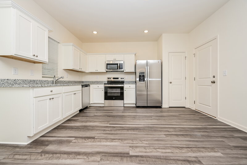 1,945/Mo, 7661 Saffron Ave Covington, GA 30014 Kitchen View