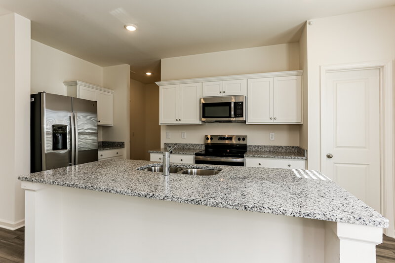 1,995/Mo, 7610 Saffron Ave Covington, GA 30014 Kitchen View