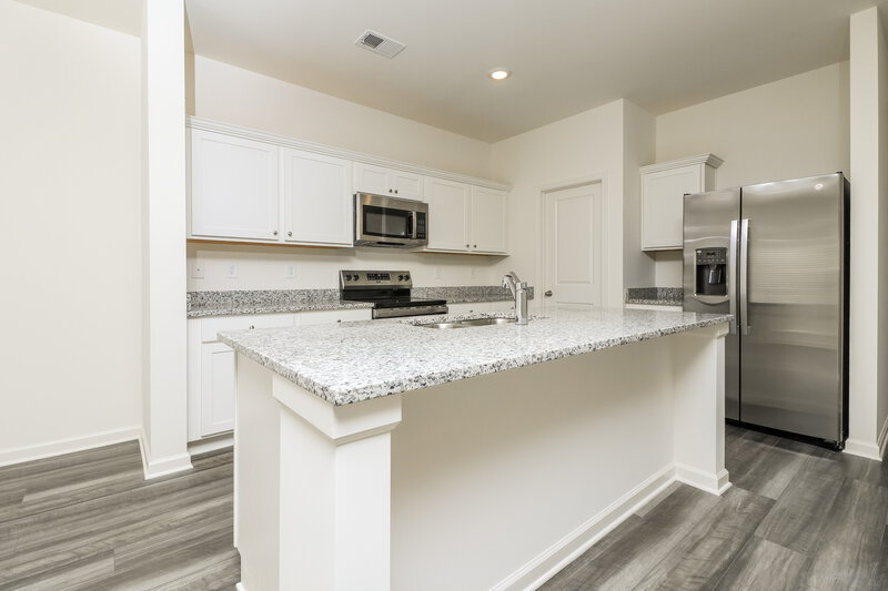 2,195/Mo, 7594 Saffron Ave Covington, GA 30014 Kitchen View 2