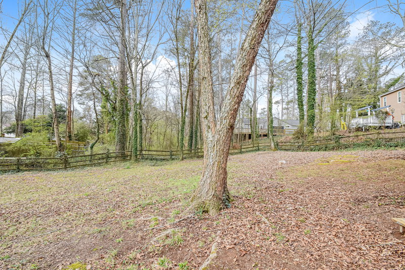 2,320/Mo, 110 River Oaks Dr Woodstock, GA 30188 Backyard View