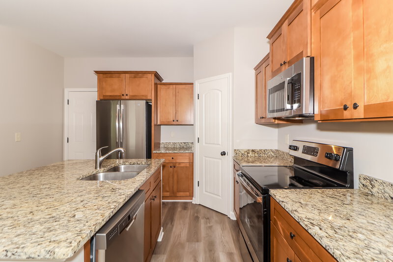 2,110/Mo, 137 Bethany Manor Dr Ball Ground, GA 30107 Kitchen View 3