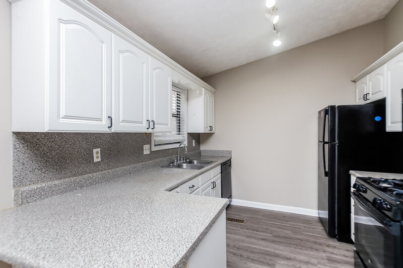 1,765/Mo, 4180 Woodcrest Dr SW Powder Springs, GA 30127 Kitchen View 2