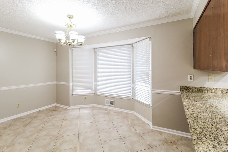 2,050/Mo, 4695 Matthews Park Dr SW Snellville, GA 30039 Dining Room View