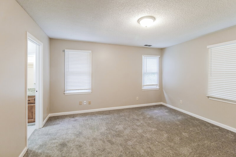 2,050/Mo, 4695 Matthews Park Dr SW Snellville, GA 30039 Main Bedroom View