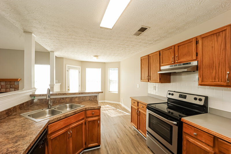 1,840/Mo, 7883 W Shore Ct Riverdale, GA 30296 Kitchen View 2