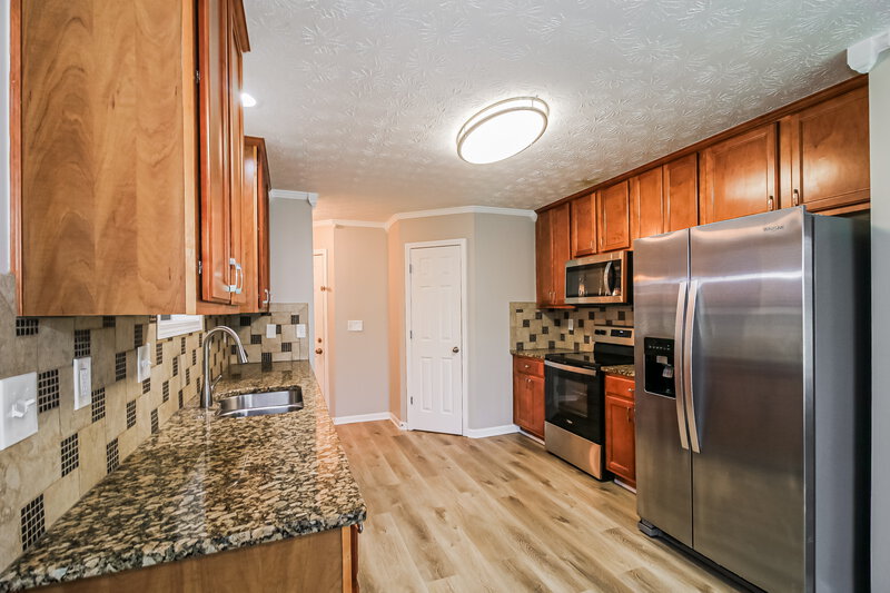2,920/Mo, 1500 Riverbrooke Way NE Conyers, GA 30012 Kitchen View