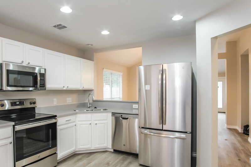 1,830/Mo, 104 Winecup Path Cedar Creek, TX 78612 Kitchen View 2