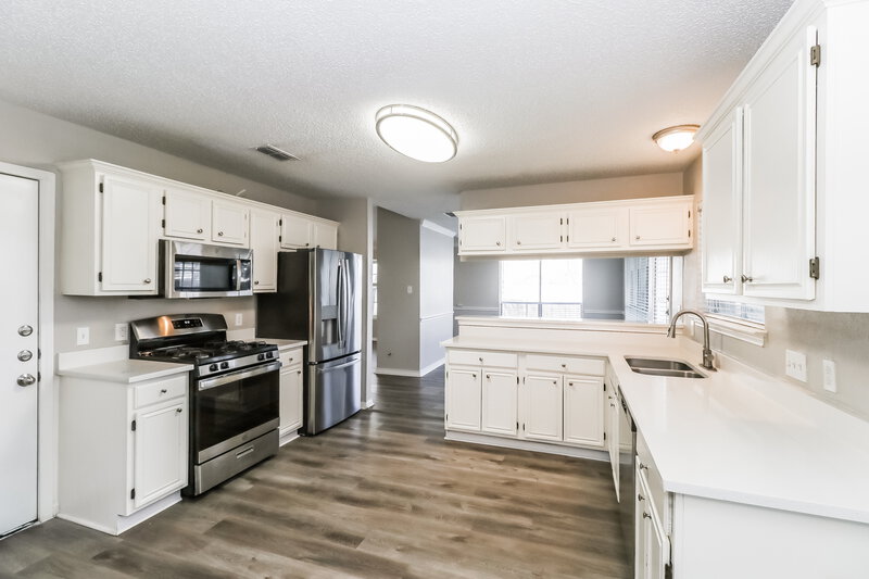 1,920/Mo, 4717 Fallenash Dr Austin, TX 78725 Kitchen View 3