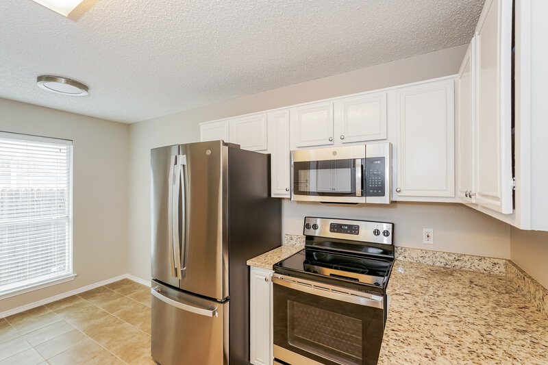 1,755/Mo, 8037 Cannonwood Dr Fort Worth, TX 76137 Kitchen View 2