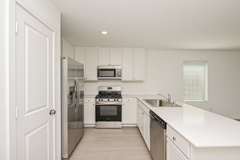 1,945/Mo, 10713 Revolver Dr Fort Worth, TX 76108 Kitchen View 3