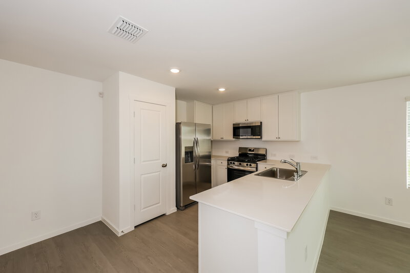 1,915/Mo, 10729 Revolver Dr Fort Worth, TX 76108 Kitchen View 2