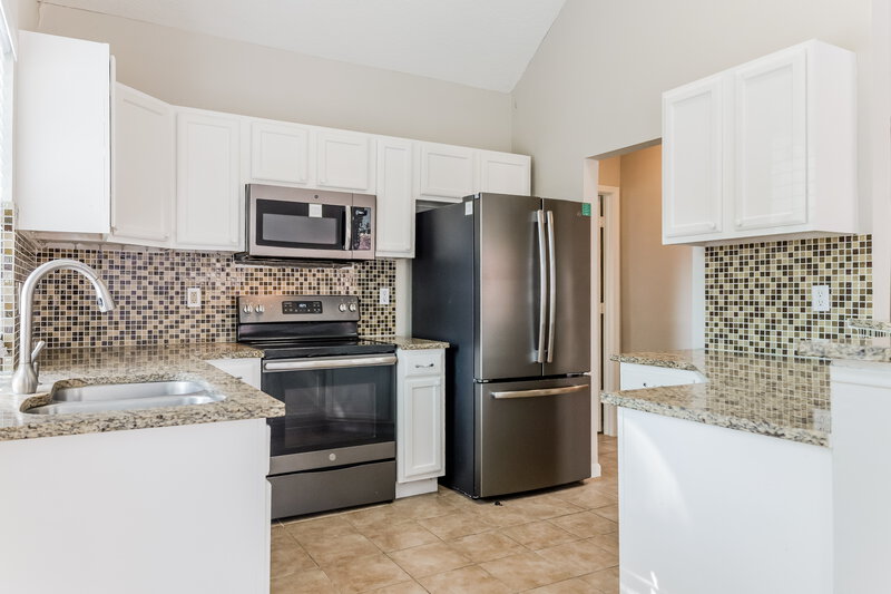 2,050/Mo, 7608 Honeybee Lane Fort Worth, TX 76137 Kitchen View 2
