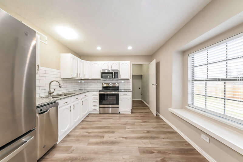 1,970/Mo, 6967 Wildbriar Ct W Fort Worth, TX 76120 Kitchen View
