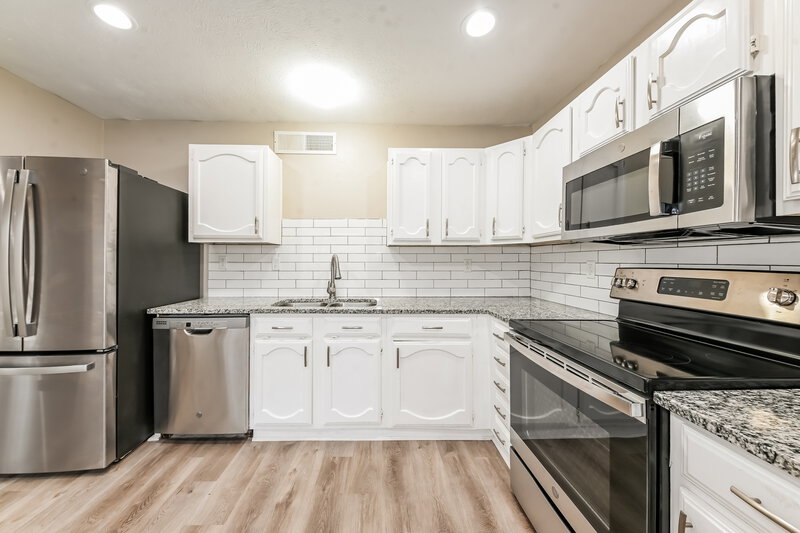 1,970/Mo, 6967 Wildbriar Ct W Fort Worth, TX 76120 Kitchen View 2