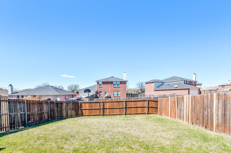 2,500/Mo, 1407 Gentle Rain Dr Lancaster, TX 75134 Rear View 2