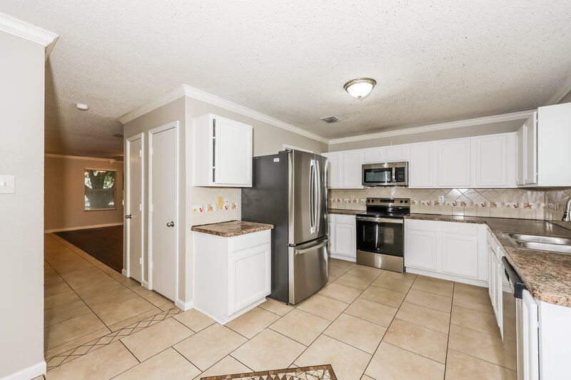 2,935/Mo, 3115 Teodoro Dr Grand Prairie, TX 75052 Kitchen View 2