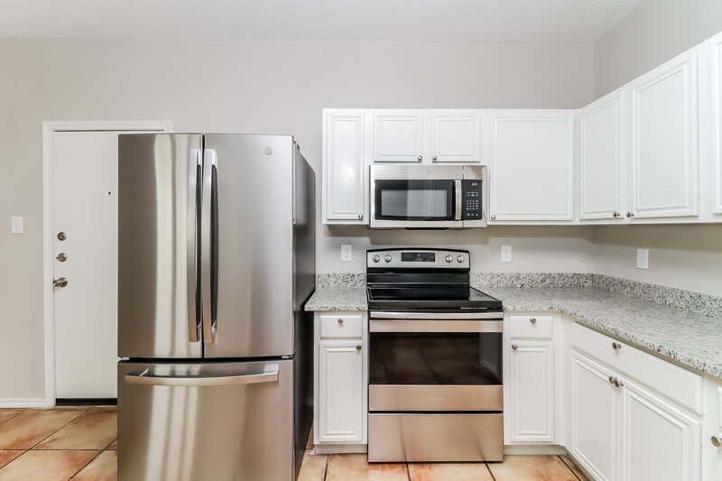 3,125/Mo, 10617 Elk Hollow Dr Fort Worth, TX 76140 Kitchen View 3