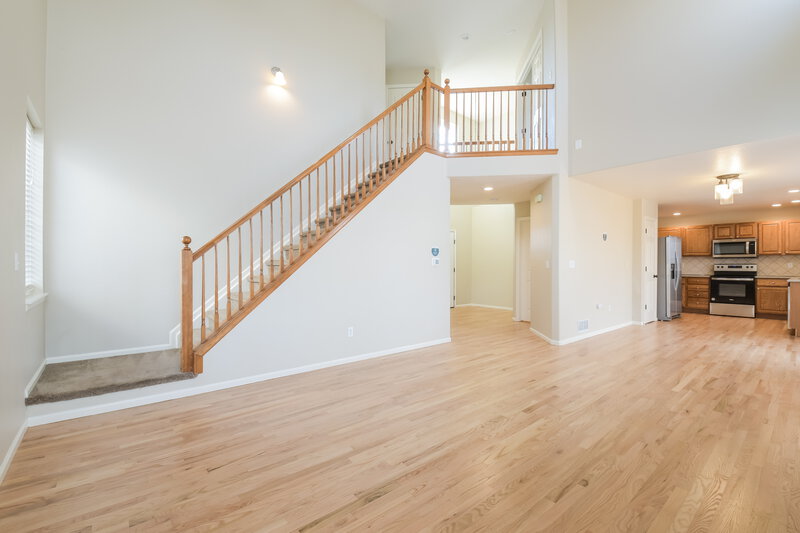3,115/Mo, 1711 Emma Ln Brighton, CO 80601 Living Room View 2