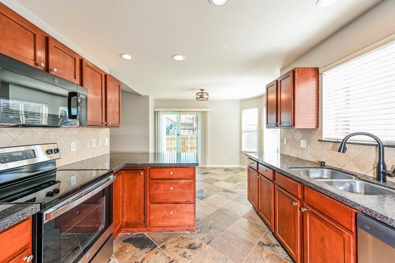 3,765/Mo, 18563 E Bates Dr Aurora, CO 80013 Kitchen View 2