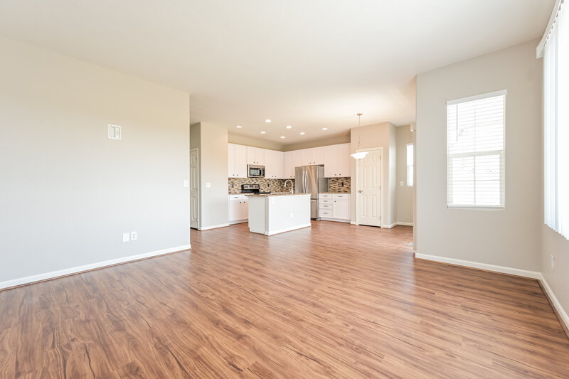 3,055/Mo, 112 Blue Stem St Brighton, CO 80601 Living Room View 2