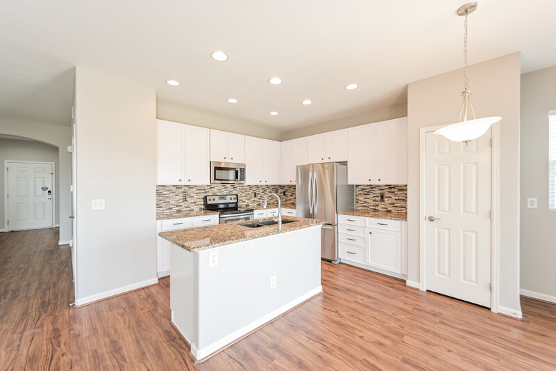 3,055/Mo, 112 Blue Stem St Brighton, CO 80601 Kitchen View