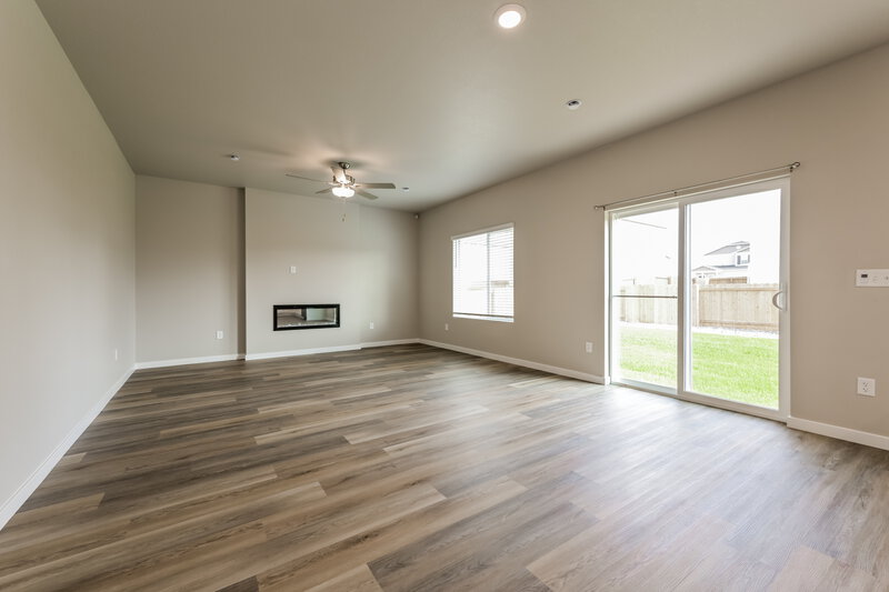 2,735/Mo, 7404 Poudre St Frederick, CO 80530 Living Room View 2