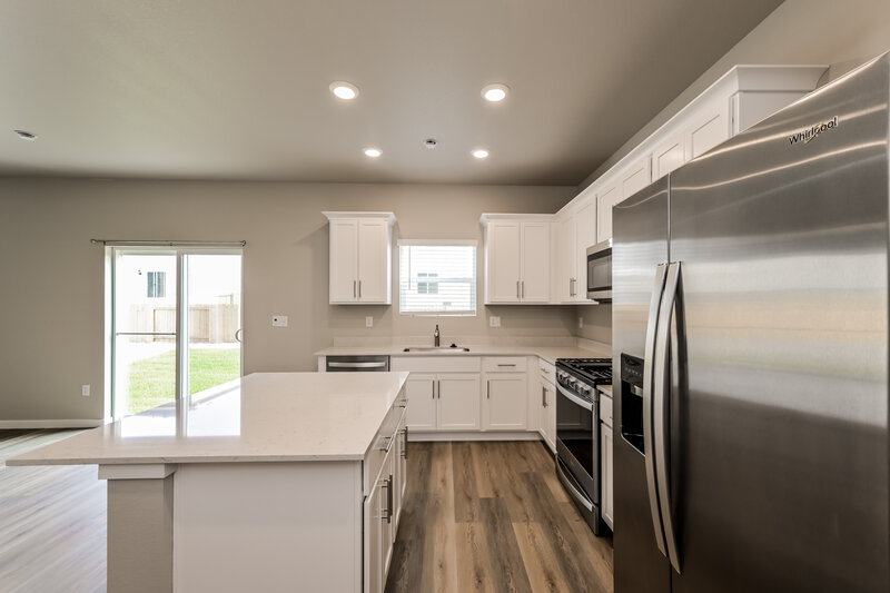 2,735/Mo, 7404 Poudre St Frederick, CO 80530 Kitchen View 2