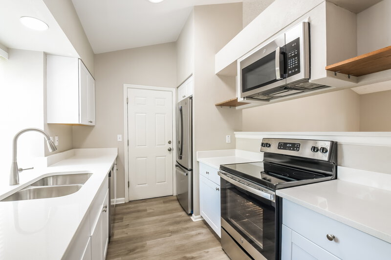 2,630/Mo, 19123 E 46th Ave Denver, CO 80249 Kitchen View 2