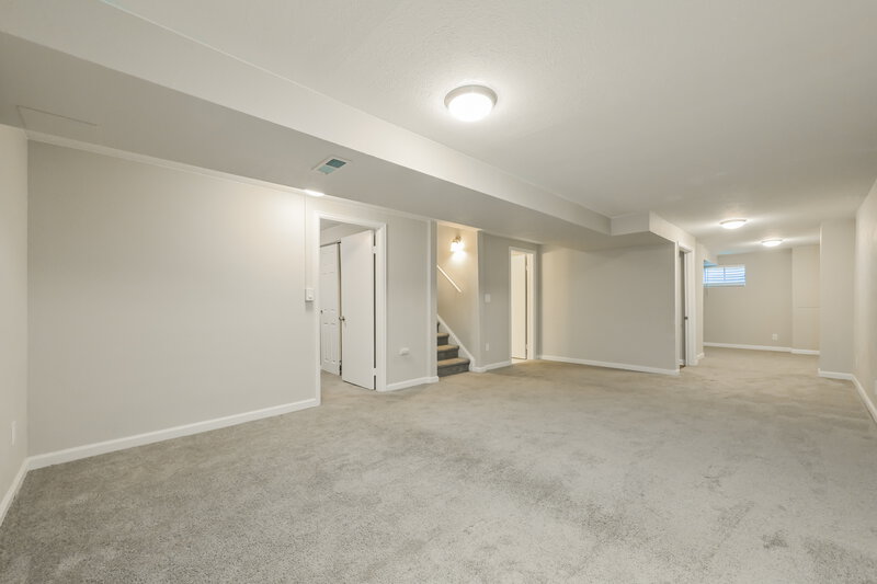 3,285/Mo, 8993 W Ontario Ave Littleton, CO 80128 Family Room View