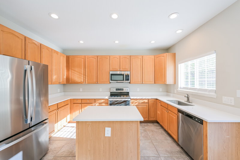 3,055/Mo, 9678 Sun Meadow St Highlands Ranch, CO 80129 Kitchen View 4