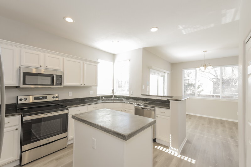 3,035/Mo, 10259 Spotted Owl Ave Highlands Ranch, CO 80129 Kitchen View 2