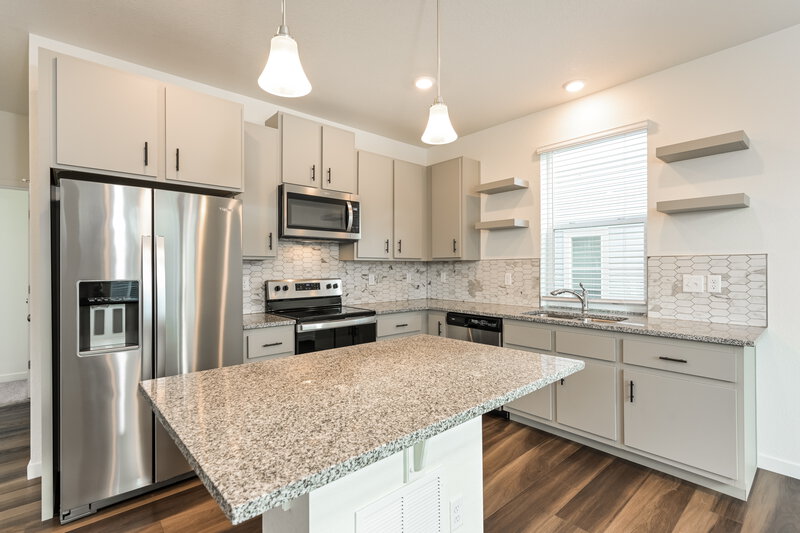 2,550/Mo, 18592 E. 47th Drive Denver, CO 80249 Kitchen View 2