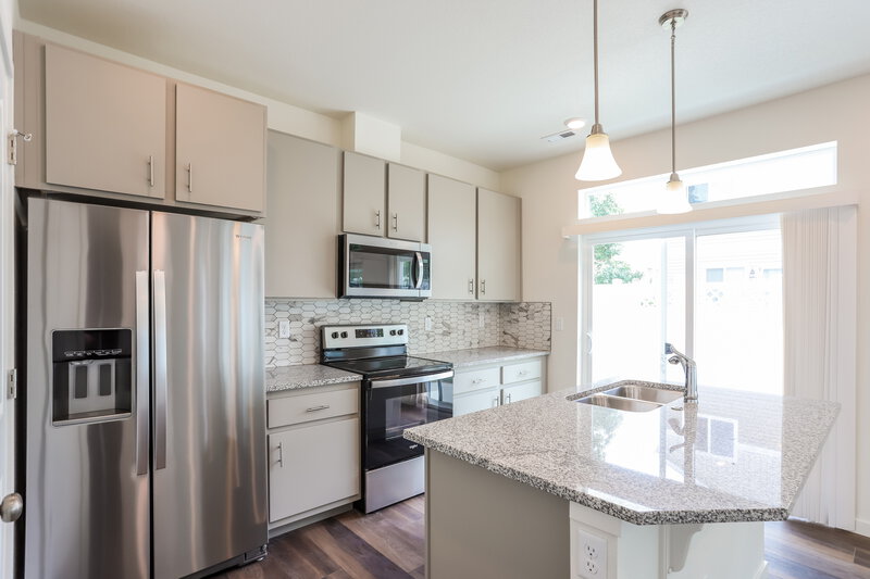 2,870/Mo, 4726 N. Tower Drive Denver, CO 80249 Kitchen View 2