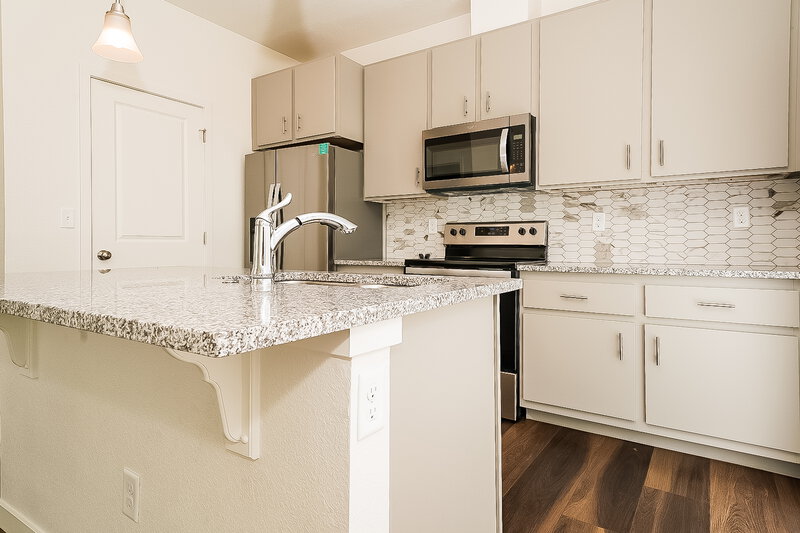 3,115/Mo, 4750 N. Tower Drive Denver, CO 80249 Kitchen View