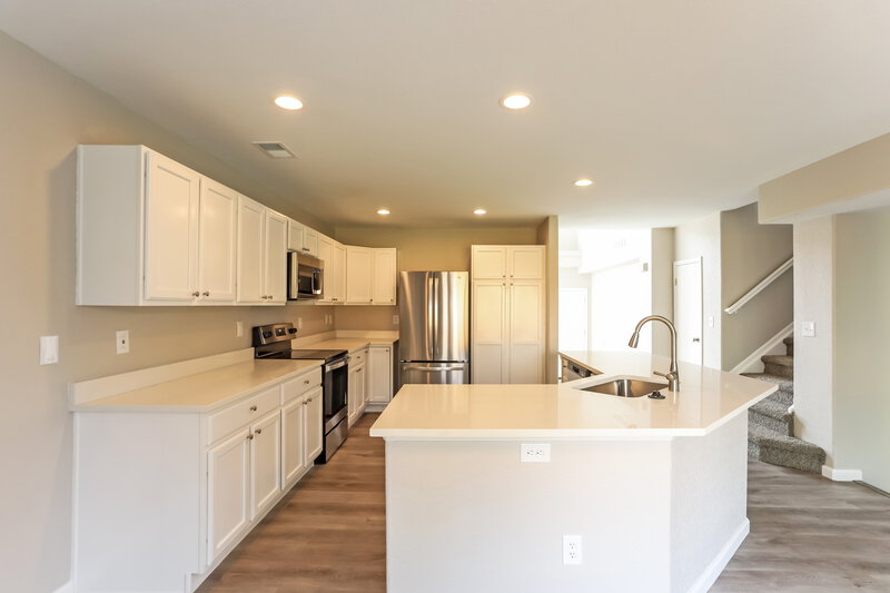 3,230/Mo, 3905 Kirk St Denver, CO 80249 Kitchen View 2