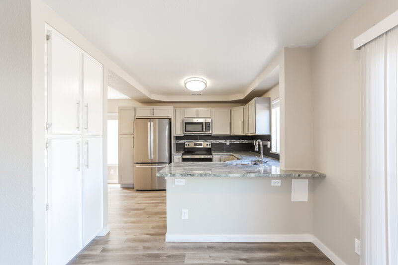 3,315/Mo, 3963 Jericho St Denver, CO 80249 Kitchen View