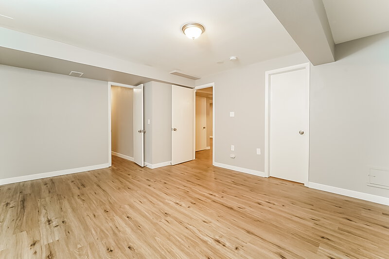 2,610/Mo, 4494 Genoa St Denver, CO 80249 Family Room View 3