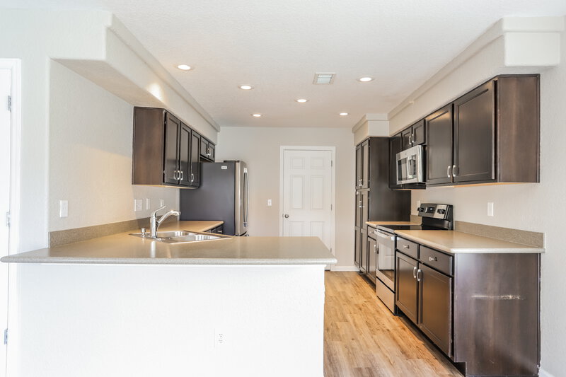 2,635/Mo, 4843 Genoa St Denver, CO 80249 Kitchen View 2