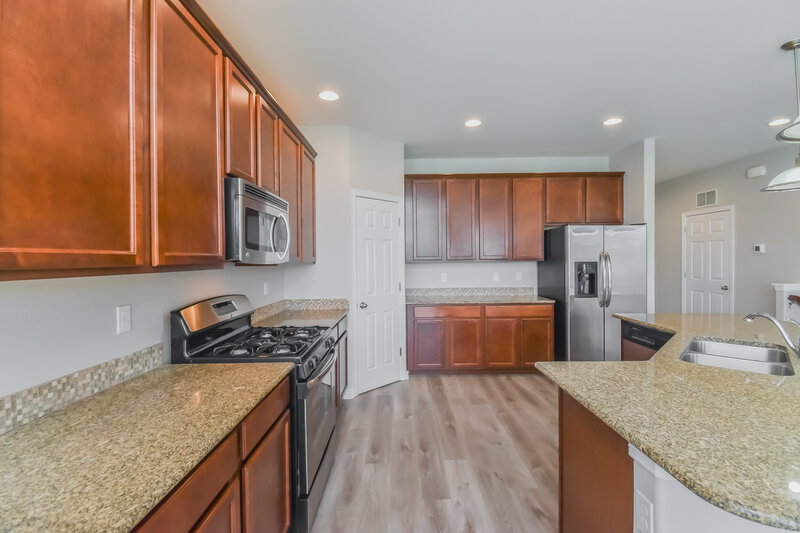 2,555/Mo, 6670 Alliance Loop Colorado Springs, CO 80925 Kitchen View