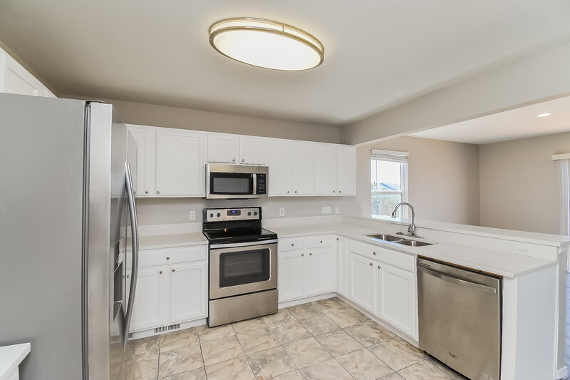 2,195/Mo, 7242 Arrowroot Ave Colorado Springs, CO 80922 Kitchen View 2
