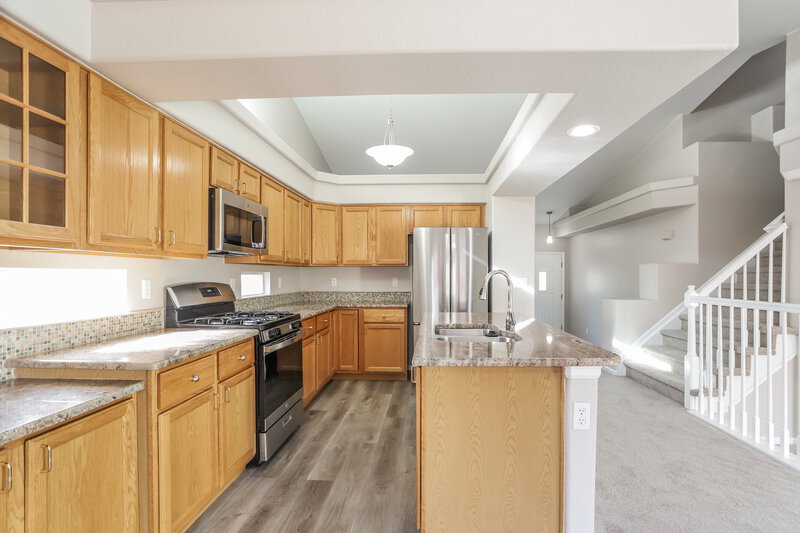 2,850/Mo, 4072 Ensenada St Denver, CO 80249 Kitchen View 2