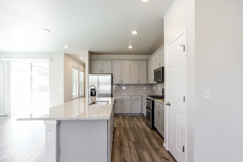 2,555/Mo, 877 Tarragon Rd Brighton, CO 80640 Kitchen View 2