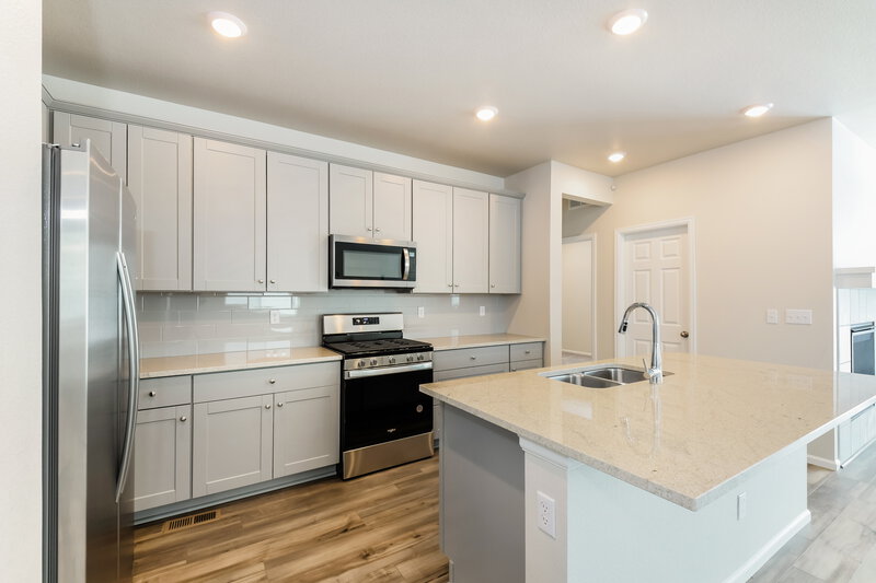 3,380/Mo, 9232 Rifle St Commerce City, CO 80022 Kitchen View 2