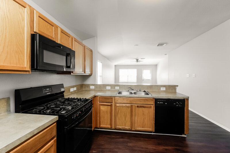 1,750/Mo, 1811 Adobe Stone Dr Humble, TX 77396 Kitchen View 2
