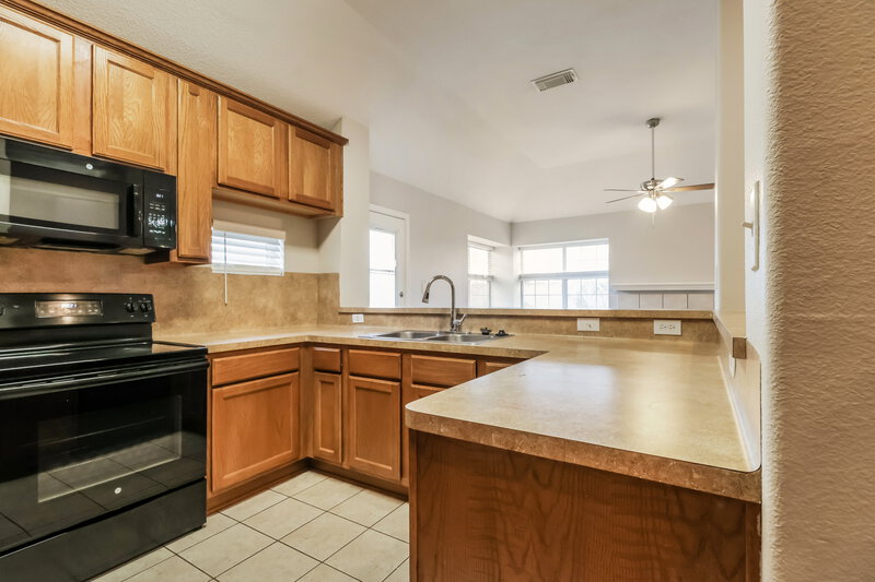 1,595/Mo, 13208 Lake Breeze Ln Willis, TX 77318 Kitchen View
