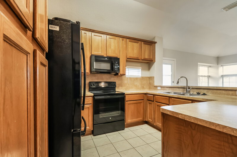 1,595/Mo, 13208 Lake Breeze Ln Willis, TX 77318 Kitchen View 2