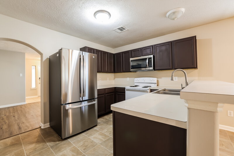 1,760/Mo, 13302 Remme Ridge Ln Houston, TX 77047 Kitchen View 2